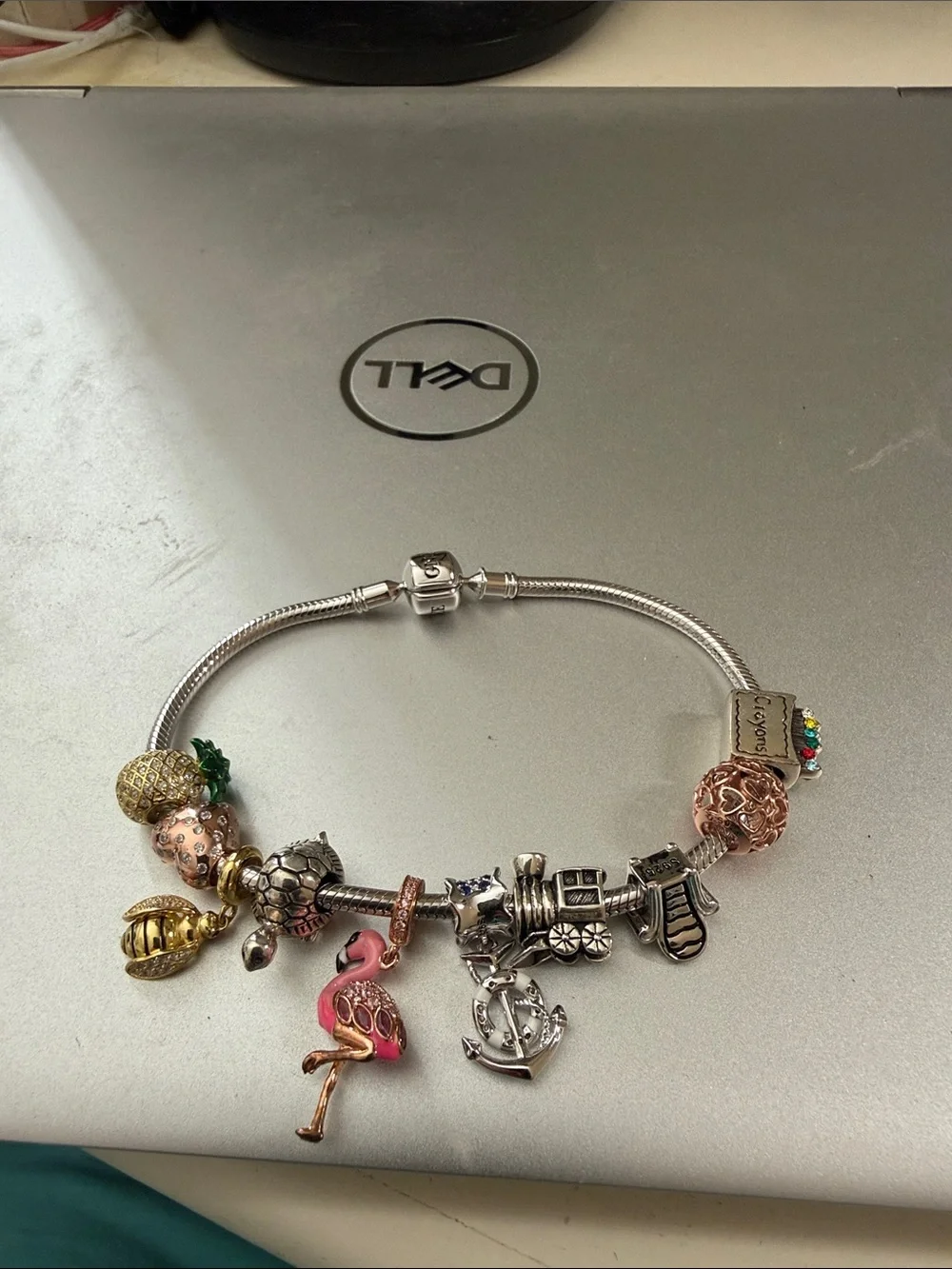 Stunning silver Pandora type 8” charm bracelet with 10 removable charms.